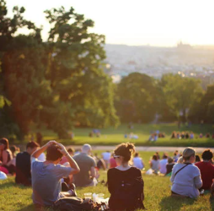 people sitting in a field